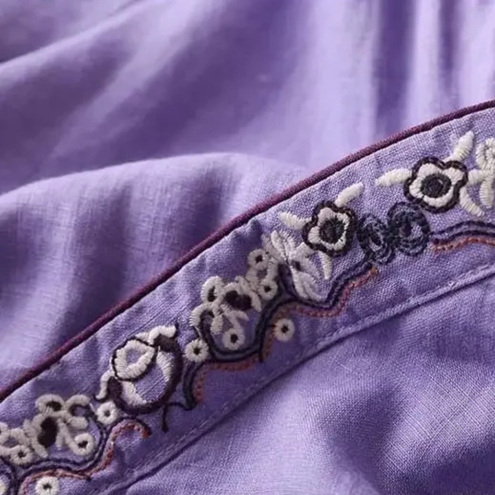 Xia | Wrap Blouse with Embroidered Trim and Side Tie