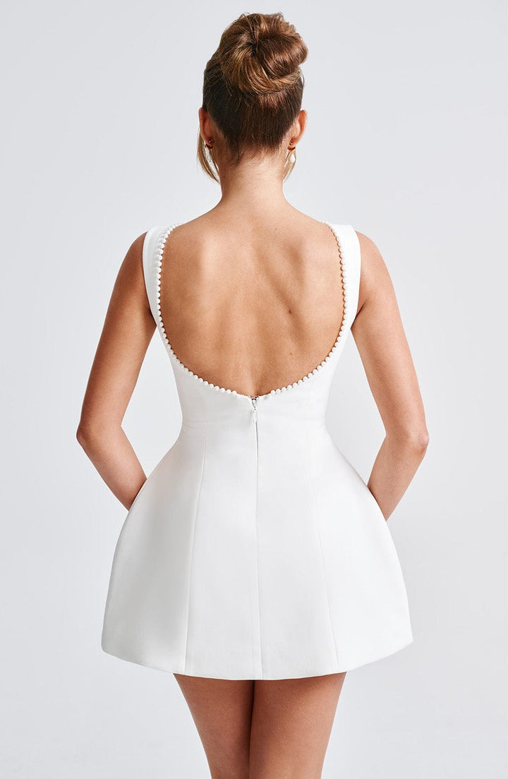 Rita | Mini Wedding Guest Dress with Boat Neck and Bow Back