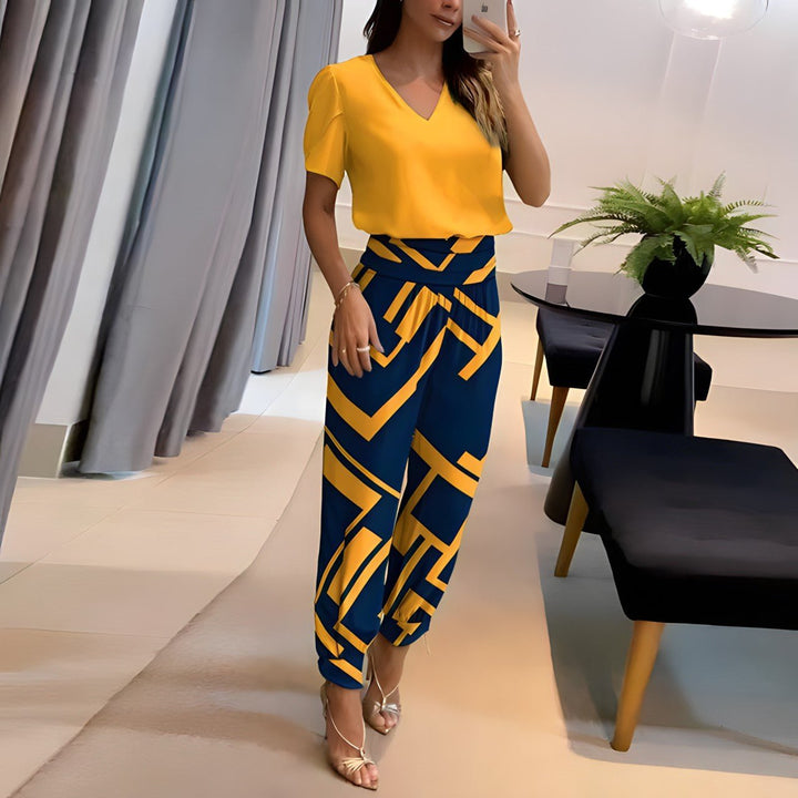Kia | Geometric Print Two-Piece Set with Wide-Leg Trousers and V-Neck Top